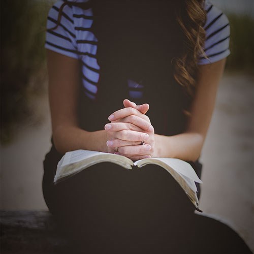 Praying over a bible
